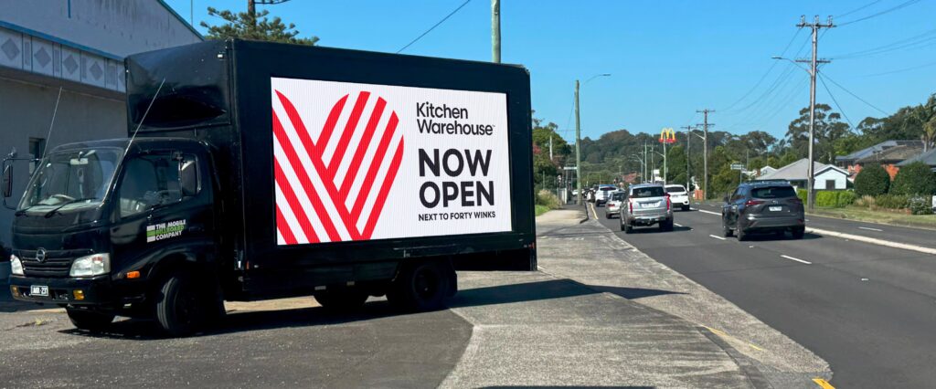 Kitchen Warehouse digital mobile billboard campaign Melbourne — LED trailer billboard at Chadstone store launch by The Mobile Billboard Company