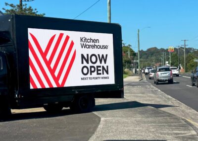 Kitchen Warehouse digital mobile billboard campaign Melbourne — LED trailer billboard at Chadstone store launch by The Mobile Billboard Company